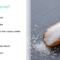 Scoop of xylitol with a table of pros and cons